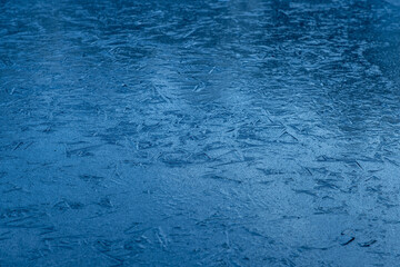 Beautiful frozen ice pond aerial view across snowy park landscape