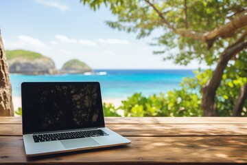 A business laptop on a wooden table in front of a beautiful sea, zoomed out