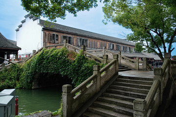 antique Chinese bridge over the river