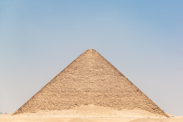 Fototapeta na wymiar View of the imposing Red Pyramid in Dahshur, Egypt. It is the first true pyramid in Egypt