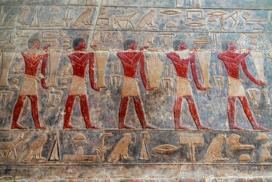 Beautiful artwork in a tomb in Saqqara, Egypt with the original paint still visible