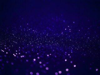 A stunning abstract background of defocused lights with blue glitter