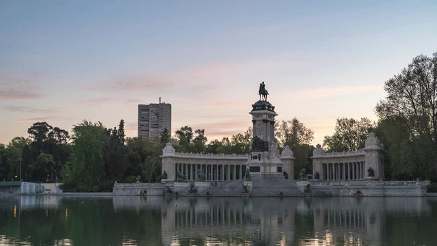 Madrid Spain time lapse, city skyline sunrise timelapse at El Retiro Park