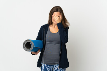 Slovak girl going to yoga classes isolated on white background with tired and sick expression