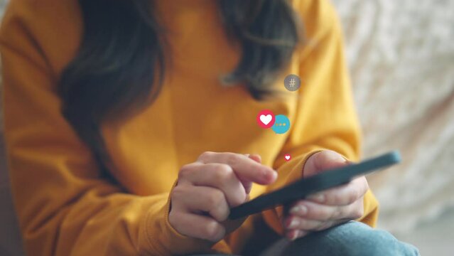 Hands of woman chat typing on smart phone relax watch live video and post button love, heart, chat, emoji icon, Social media, social network concept