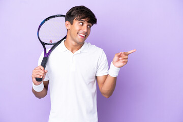 Handsome young tennis player man isolated on ocher background intending to realizes the solution...