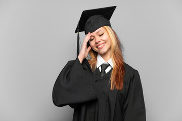 Young university graduate girl over isolated background smiling a lot