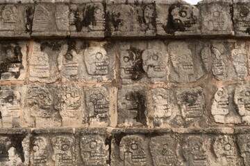 Skull pattern on the Tzompantli, skull platform, plataforma de los craneos, at Chichen Itza, close to Valladolid, Mexico