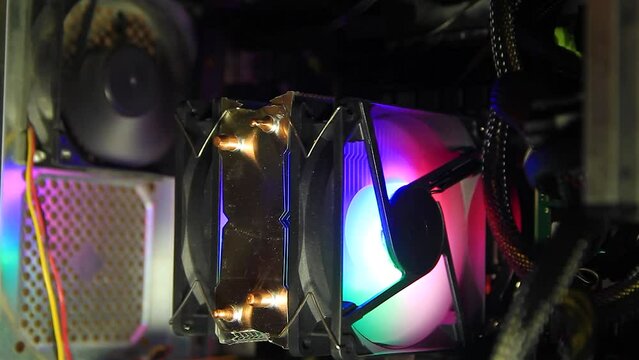 In bright colors the propeller, the cooler works and cools computer components