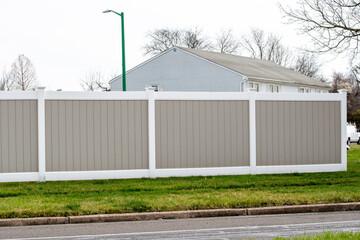 Obraz premium vinyl fence in residential neighborhood home
