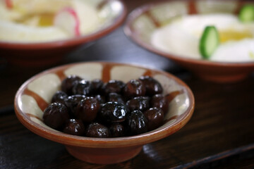 Olives Served with Hummus and Labneh