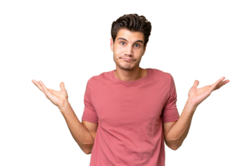 Young handsome caucasian man over isolated background having doubts while raising hands