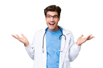 Young doctor man over isolated background with shocked facial expression