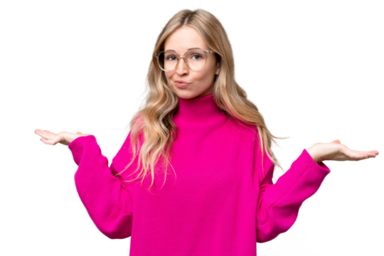 Young English woman over isolated background having doubts while raising hands