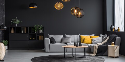 Modern gray living room with black and white decor, including furniture and lighting.