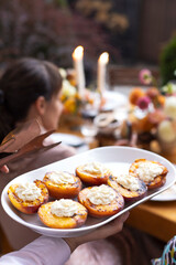 Grilled tasty cut peaches, served with whipped cheese cream, closeu