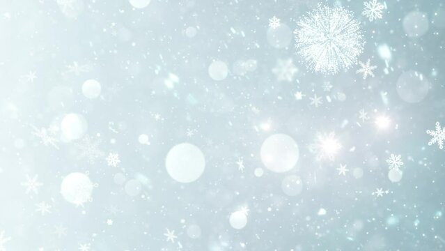 Snowflake, fireworks, and bokeh particles video animation background