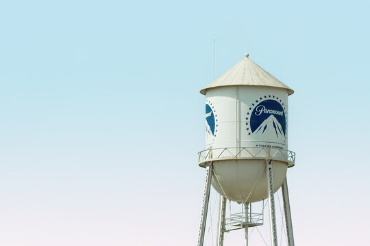 LOS ANGELES, CALIFORNIA, USA - APRIL 18, 2023: Paramount Pictures film studio in Hollywood, Los Angeles, USA. Water Tower with the Paramount logo on studio lot. Copy space.