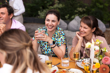 Many people saying cheers and showing their champagne glasses. Wedding party © Dasha Petrenko
