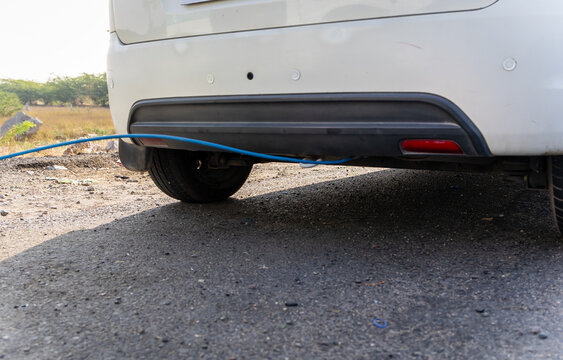 pollution checking of car under progress at national highway at day