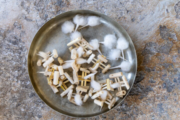 candle floating wick made of wood and cotton at plate