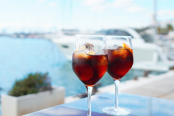 Spanish vermut(vermouth) to drink at a bar in a yacht harbor