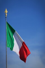 Italian flag waving from the flagpole
