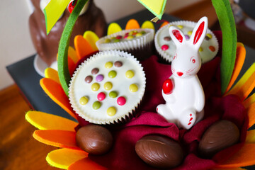 Fototapeta premium Easter card design. Easter cupcake, Easter chocolate eggs and bunny 