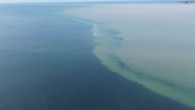 Aerial View of the Confluence of Seawater and Freshwater in the Waters of Gorontalo, Indonesia. Halocline in the water