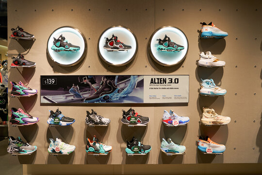 SINGAPORE - NOVEMBER 06, 2023: various footwear displayed inside Anta Basketball store. Anta Sports Products Limited is a Chinese sports equipment multinational corporation.