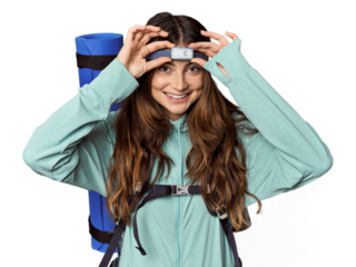 Young Caucasian woman with mountain gear & headlamp