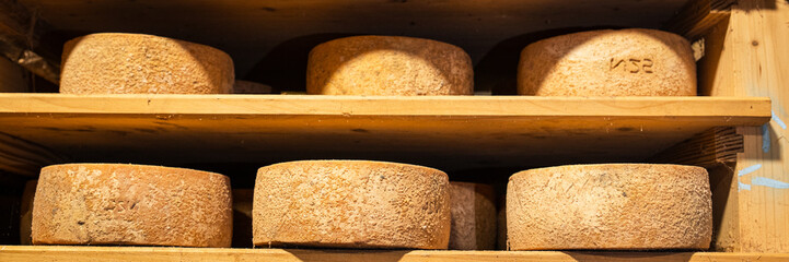 aged cheese in the cellar ready to eat eating cooking appetizer meal food snack on the table copy space food