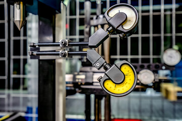Lever type indicators for measuring runout and accuracy of parts and cutting tools.