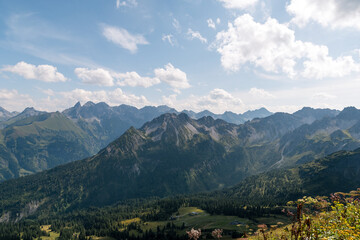 Fototapeta na wymiar view from the mountain Fellhorn to the near valley and Fiderescharte at the Allgäu mountains.