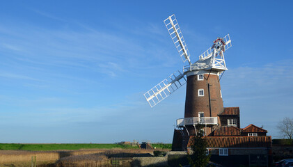 Fototapeta na wymiar Cley windmill and marshes North Norfolk England.