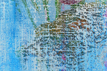Obraz premium The texture of a canvas painted blue with a spot of a different color shade.
