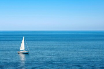 Obraz premium Lone sailboat drifting on a vast ocean horizon