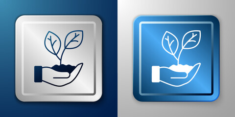 White Hand hold a leaf of the plant icon isolated on blue and grey background. Care nature. Leaf shoots with environmental protection. Silver and blue square button. Vector