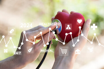 Doctor pressing button with heart  health on virtual panel medicine and healthcare closeup.