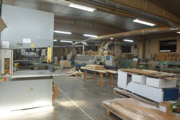 interior of a carpentry shop with a band saw
