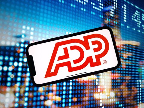 Konskie, Poland - January 07, 2024: Automatic Data Processing company logo displayed on mobile phone