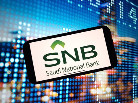 Konskie, Poland - January 07, 2024: The Saudi National Bank company logo displayed on mobile phone