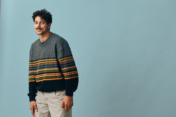 Studio man copyspace trendy hair handsome portrait smile hipster sweater face fashion confident