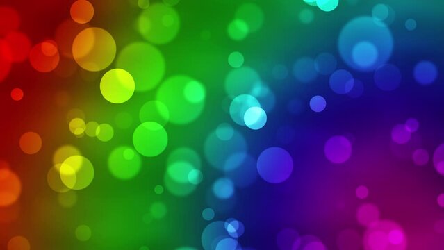 Colorful glowing bokeh particles animation.Colorful or rainbow background.Moving bubbles colorful blurred animation backdrop.Rainbow flag,LGBT pride flag or gay pride flag.