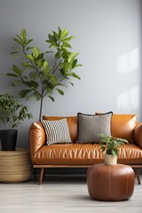 brown leather sofa in a living room with plants