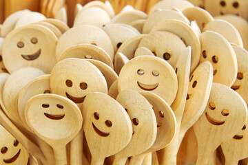Funny carved wooden dippers, seem like smilies