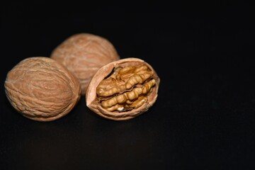 walnuts on black background