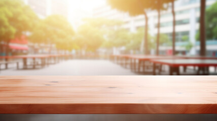 Empty wooden table to display products, front of blurred restaurant background, beautiful design packshot