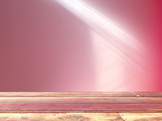 Light and shadow on pink background and wooden floor.
