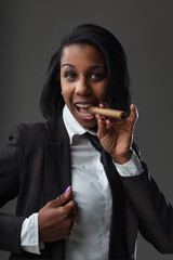 Spirited expression, cigar, woman personifies playful success